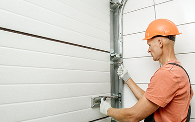 DIY Garage Door Repairs: What You Can Safely Handle and What to Leave to the Pros